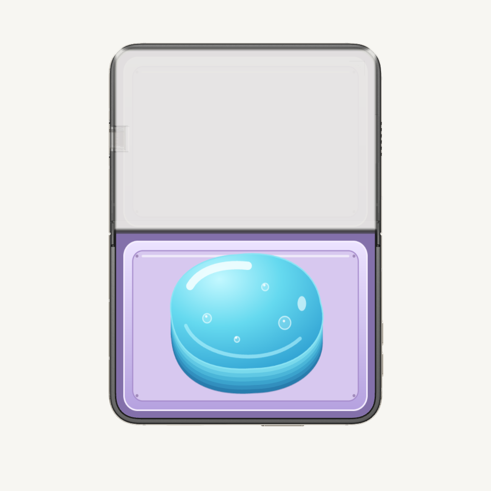 Blue Squishy gel resting on the Pocket Press pad, ready to squeeze.